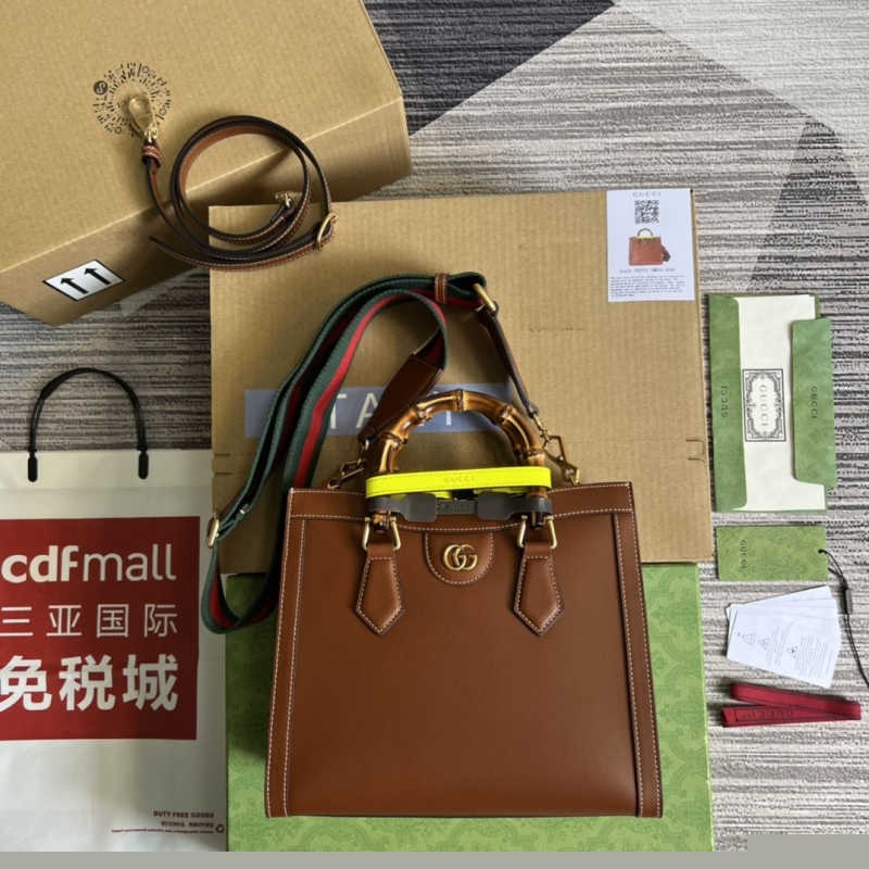 G*u*i top handle bags